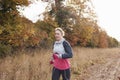 Mature Woman Running Around Autumn Field Royalty Free Stock Photo