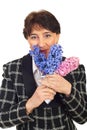 Mature woman smelling hyacinth Royalty Free Stock Photo