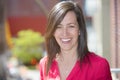 Mature Woman Smiling Outside On A Balcony Royalty Free Stock Photo