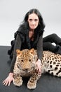 Mature woman and spotty leopard