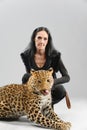 Mature woman and spotty leopard