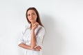 Freestyle. Woman standing isolated on white looking aside concerned