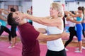 Mature woman training with coach Royalty Free Stock Photo