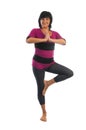 Mature woman in Vrikshasana yoga pose