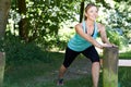 Mature Woman Warming Up Before Exercising In Countryside Royalty Free Stock Photo