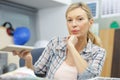 Mature woman in workshop