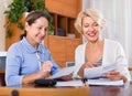 Mature women with documents Royalty Free Stock Photo