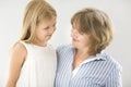 Mature woman embrace with young girl Royalty Free Stock Photo