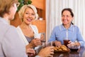 Mature women having coffee break Royalty Free Stock Photo