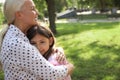 Mature woman with her little granddaughter in park Royalty Free Stock Photo