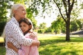 Mature woman with her little granddaughter in park Royalty Free Stock Photo