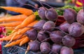 Mature young carrots and red beets on sale