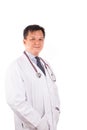 Matured, confident Asian male medical doctor with stetescope, white coat Royalty Free Stock Photo