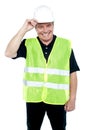 Matured construction worker holding his safety helmet Royalty Free Stock Photo