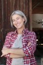 Matured farm woman with crossed arms Royalty Free Stock Photo