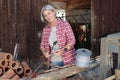 Matured farm woman at work Royalty Free Stock Photo
