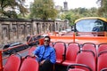 Matured Indian Man Sitting on an Open Deck Tourist Sightseeing Bus Royalty Free Stock Photo