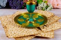 Matzah, kiddush wine and seder with text in hebrew egg, bone herbs, karpas chazeret and charoset. Passover concept Royalty Free Stock Photo