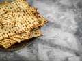 Matzah is a traditional kosher Jewish Passover bread. The great holiday is Jewish Passover. Beautiful light background. There is Royalty Free Stock Photo