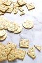 Matzo crackers, salty crackers with sesame seeds and flax seeds on a light background Royalty Free Stock Photo