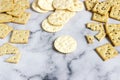 Matzo crackers, salty crackers with sesame seeds and flax seeds on a light background Royalty Free Stock Photo