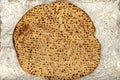 Matzo texture, a top view of a piece of traditional wheat dry bread served on Hebrew Passover