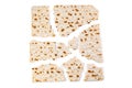 Matzo. Traditional jewish easter bread. Passover holiday symbol. Broken matzo, lies in a heap. Isolated on white. With some free