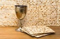 Matzo and wine in bowl for passover celebration on the wooden table Royalty Free Stock Photo