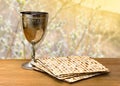 Matzo and wine in bowl for passover celebration on the wooden table Royalty Free Stock Photo