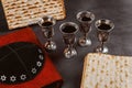 Matzoh jewish passover bread in the traditional seder plate with kipah