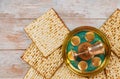 Matzoh passover holiday jewish celebration with matzoh seder with text in hebrew egg, bone, herbs, karpas, chazeret and charoset Royalty Free Stock Photo