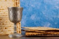 Kiddush cup of wine with matzos bread. Jewish pesah holiday