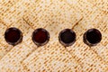 Matzot four glasses of red wine symbols of Passover Royalty Free Stock Photo