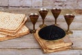 Matzot four glasses of red wine symbols of Passover Royalty Free Stock Photo