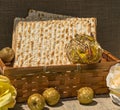 Matzot in a wicker basket with souvenir apples