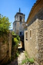 Maubec street arch alley medieval ancient village in Provence, France