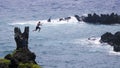 A Cliff Jumper at Waianapanapa State Park, Maui, Hawaii Royalty Free Stock Photo