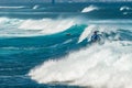 MAUI, HAWAII, USA - DECEMBER 10, 2013: Surfers are riding waves Royalty Free Stock Photo