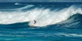 MAUI, HAWAII, USA - DECEMBER 10, 2013: Surfers are riding waves Royalty Free Stock Photo