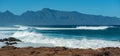 MAUI, HAWAII, USA - DECEMBER 10, 2013: Surfers are riding waves Royalty Free Stock Photo