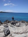 Tourist stands on Lava flow Bluff.