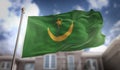 Mauritania Flag 3D Rendering on Blue Sky Building Background