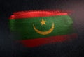 Mauritania Flag Made of Metallic Brush Paint on Grunge Dark Wall