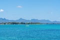 Mauritius Island, sea water and island mountains view. Turquoise water, tropical vacance.