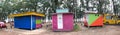 MAURITIUS - MAY 2, 2019: Colorful huts selling food on the beach, panoramic view. They are typical on the island