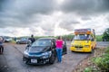 MAURITIUS - MAY 4, 2019: Tourist near the airport runway wait for arriving airplane. This is a famous tourist attraction