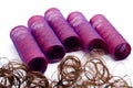 Mauve curler and hairpiece Royalty Free Stock Photo