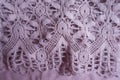 Mauve old fashioned lacy fabric