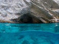 Mavi Magara - blue cave near Oludeniz, split underwater image Royalty Free Stock Photo