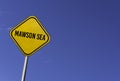 Mawson Sea - yellow sign with blue sky background